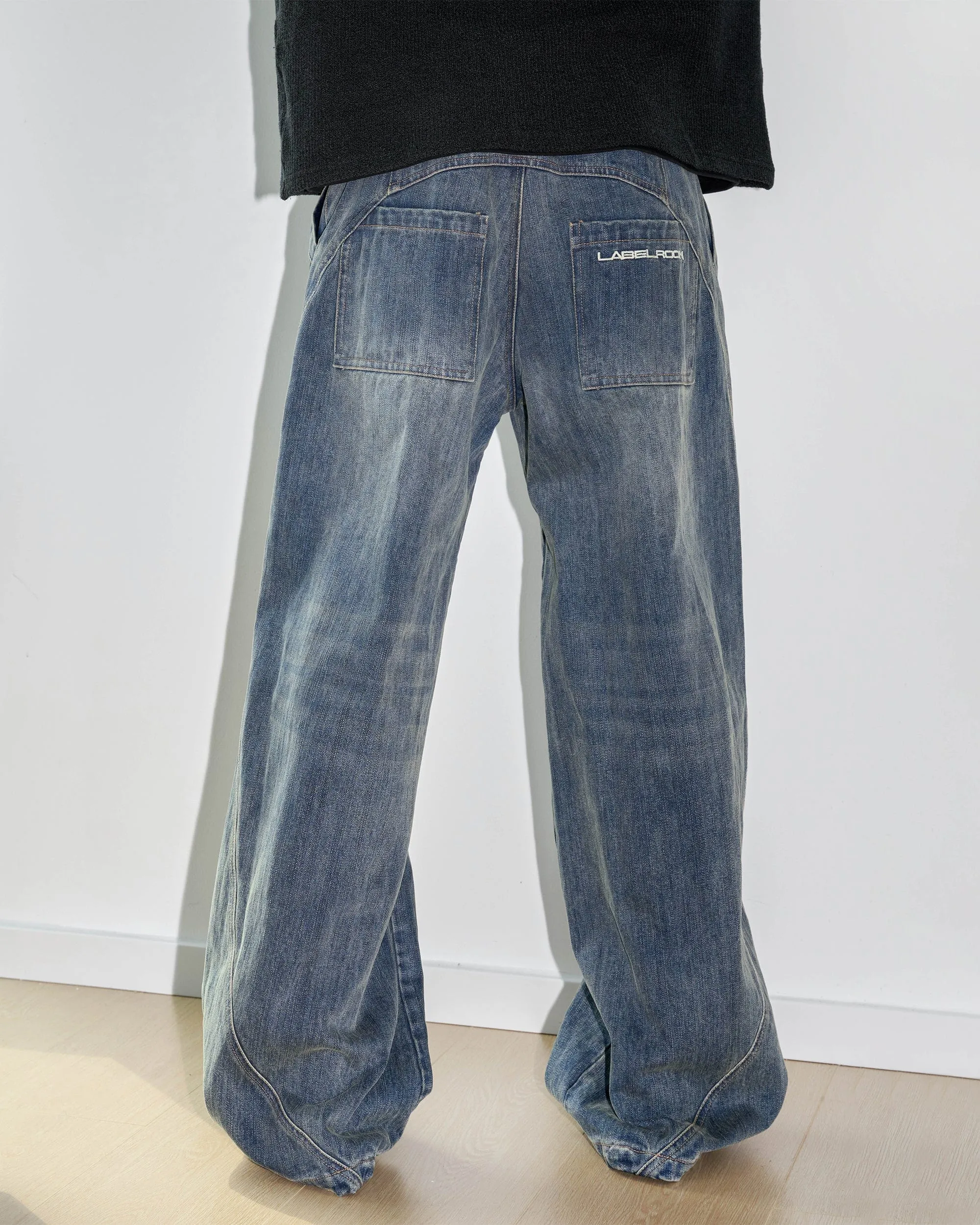 Deconstructed Washed Wide Leg Denim Jeans