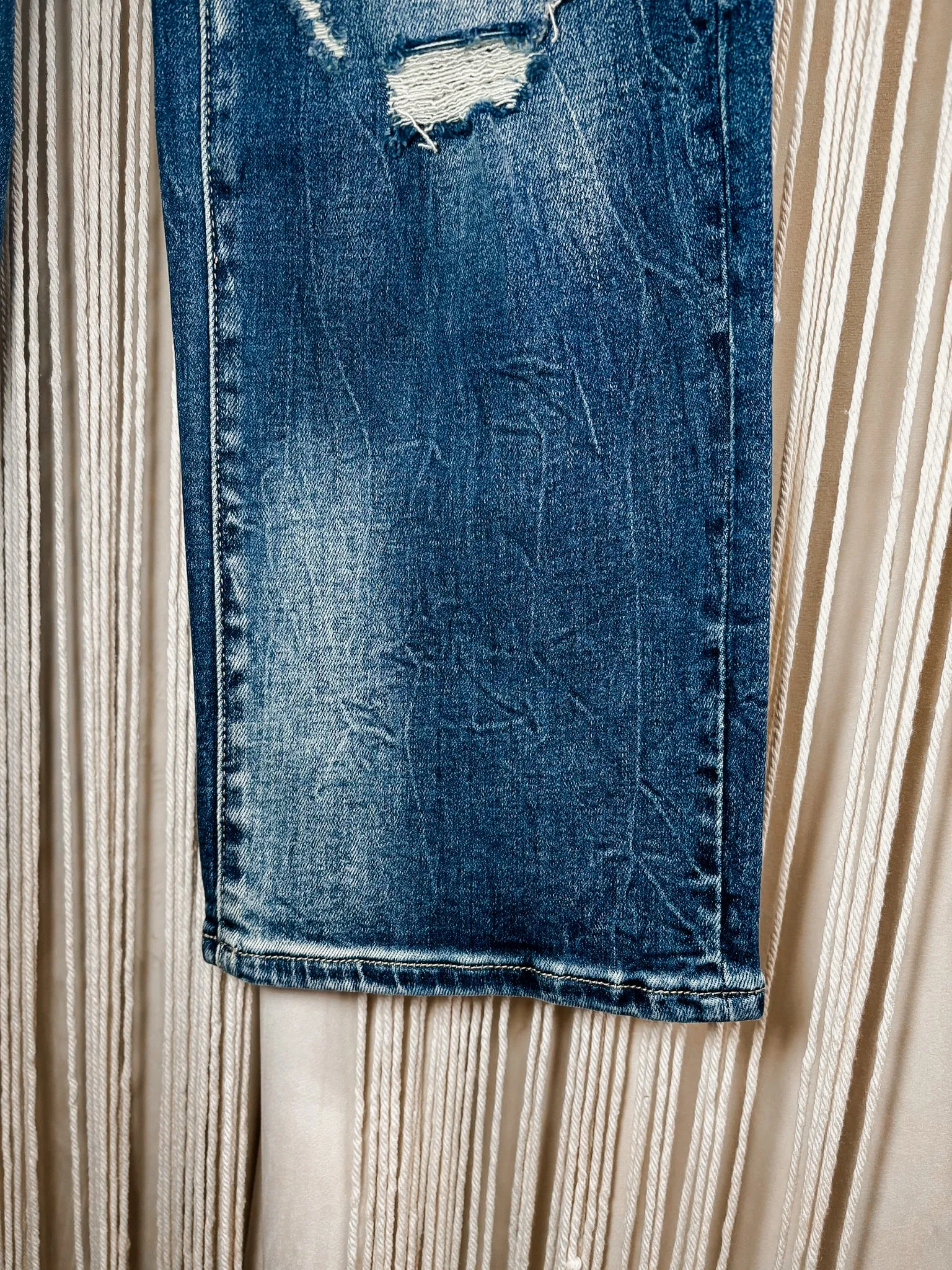 Destroyed high rise straight leg jeans