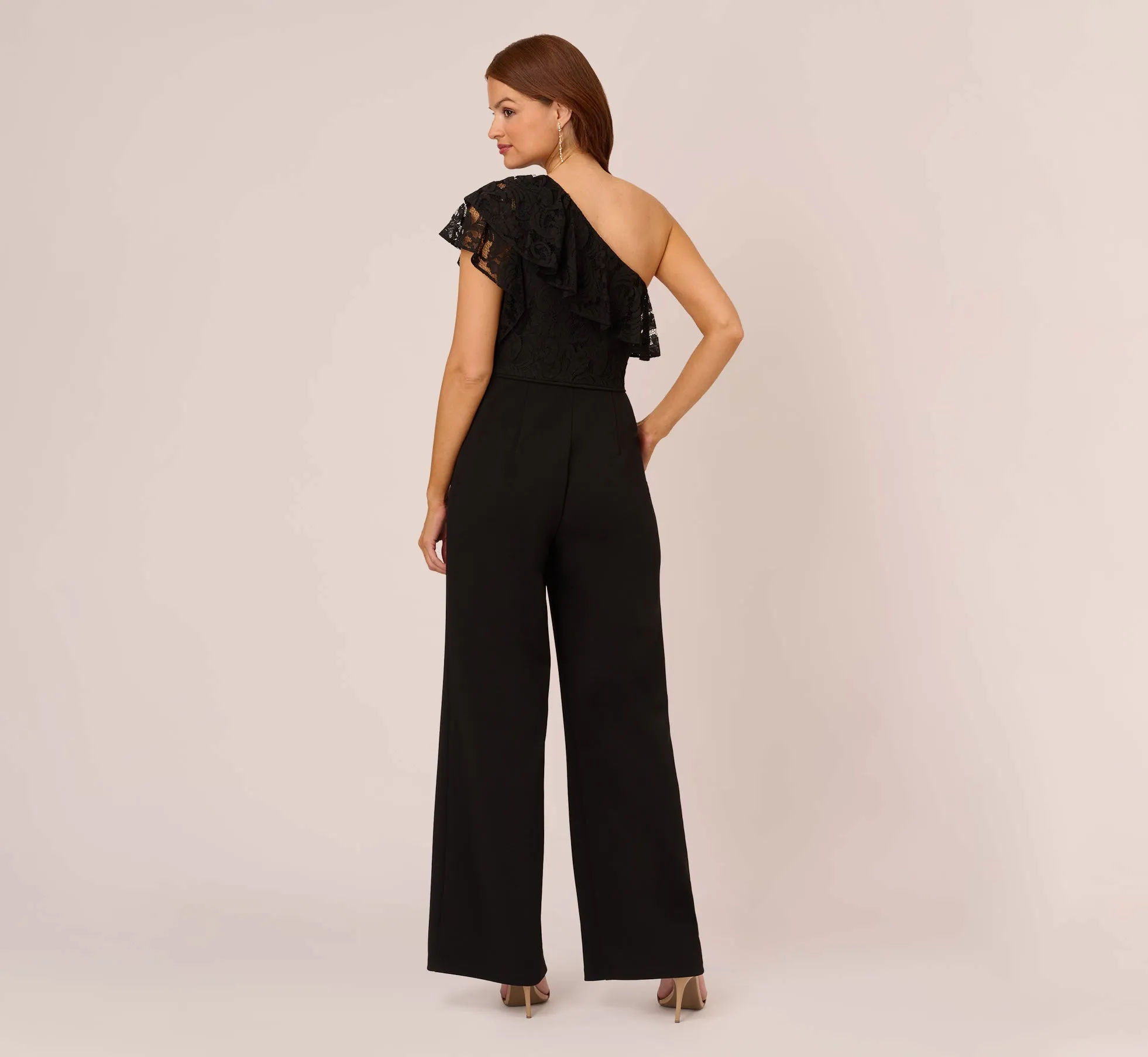 One Shoulder Crepe Jumpsuit With Lace Ruffle Details In Black